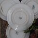 Lot of four mismatched hollow plates