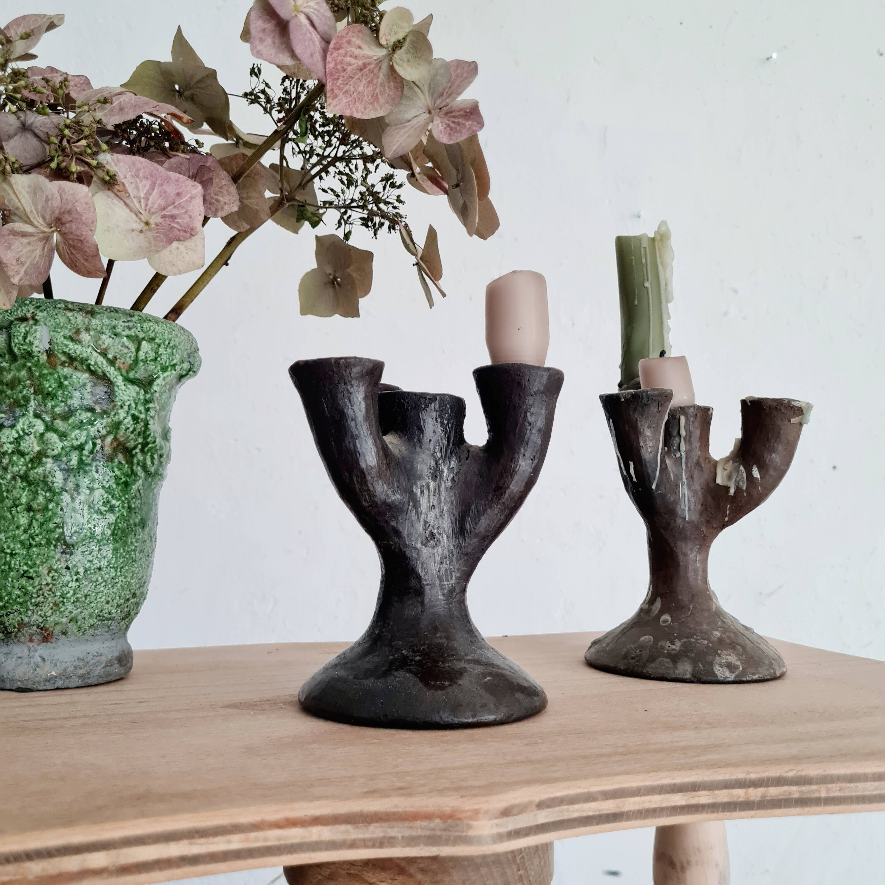 Antique terracotta candlesticks