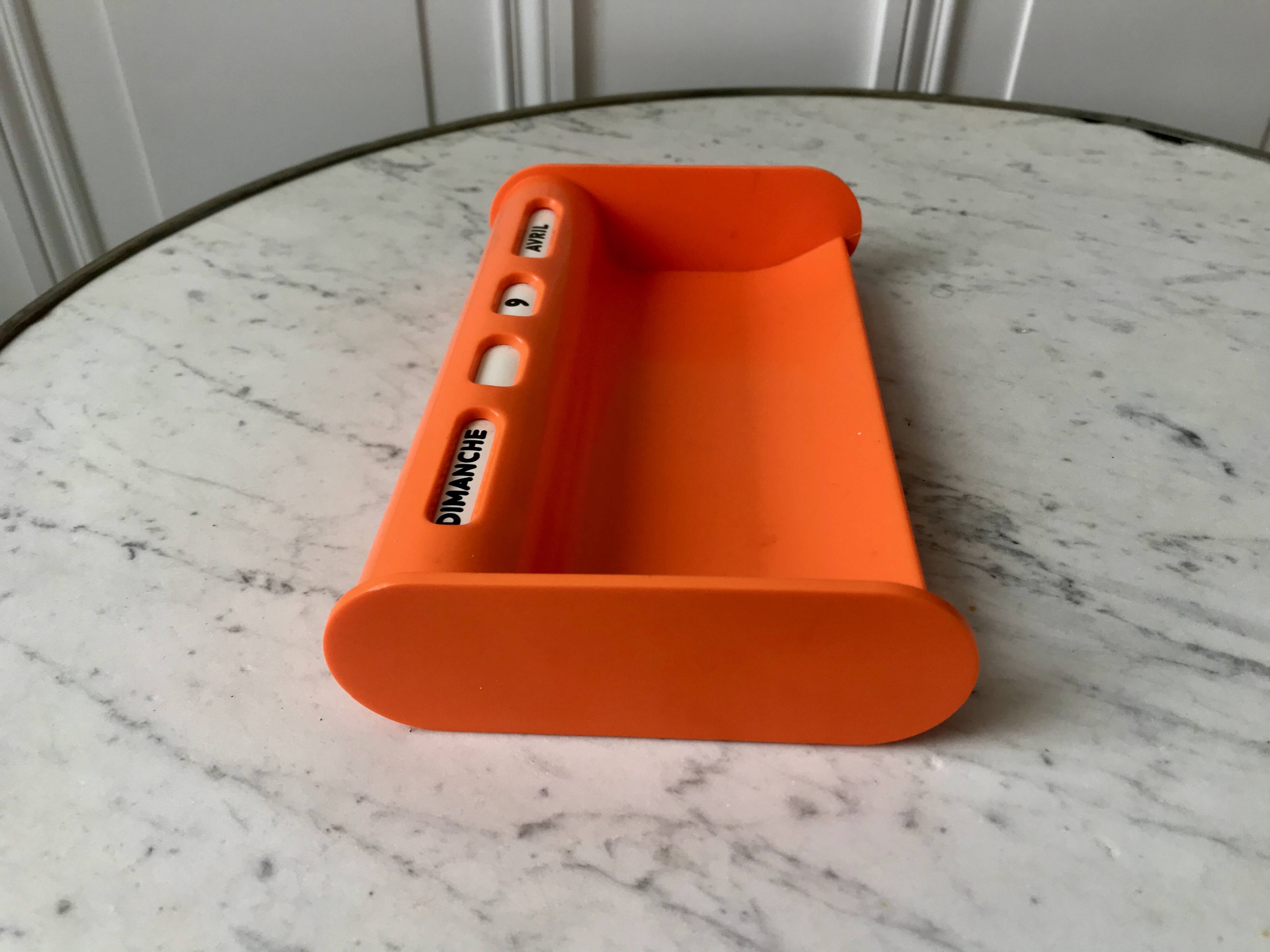 Dater empty pocket in orange plastic seventies 70s