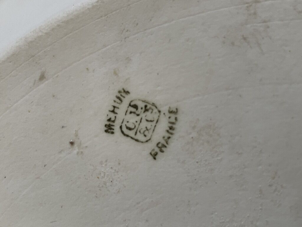 Ancient dish with floral decoration