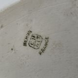 Ancient dish with floral decoration