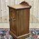 English bedside table in blonde mahogany from the early 20th century.