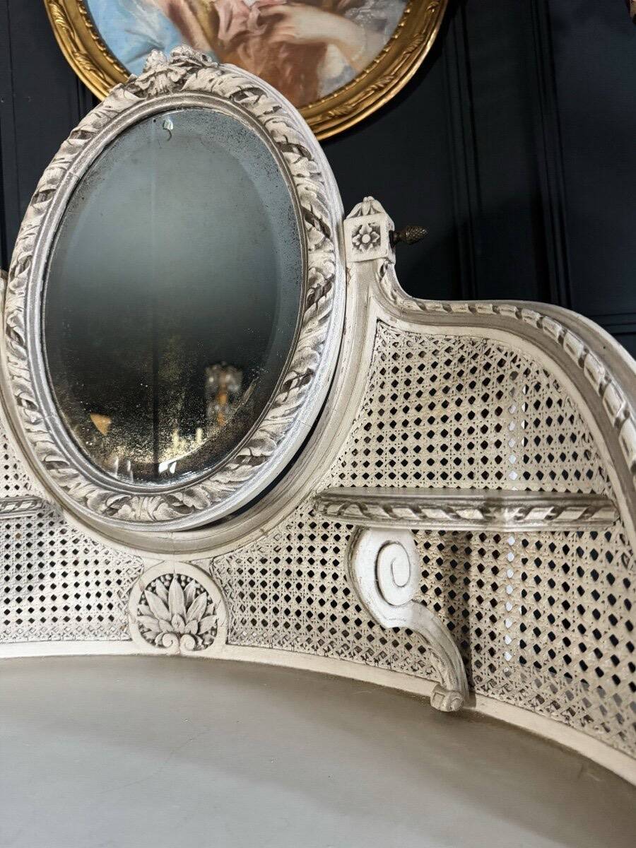 Coiffeuse du XIXe en bois peint et cannage de style Louis XVI
