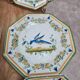 Set of 12 small antique plates by Alfred Renoleau, different designs.