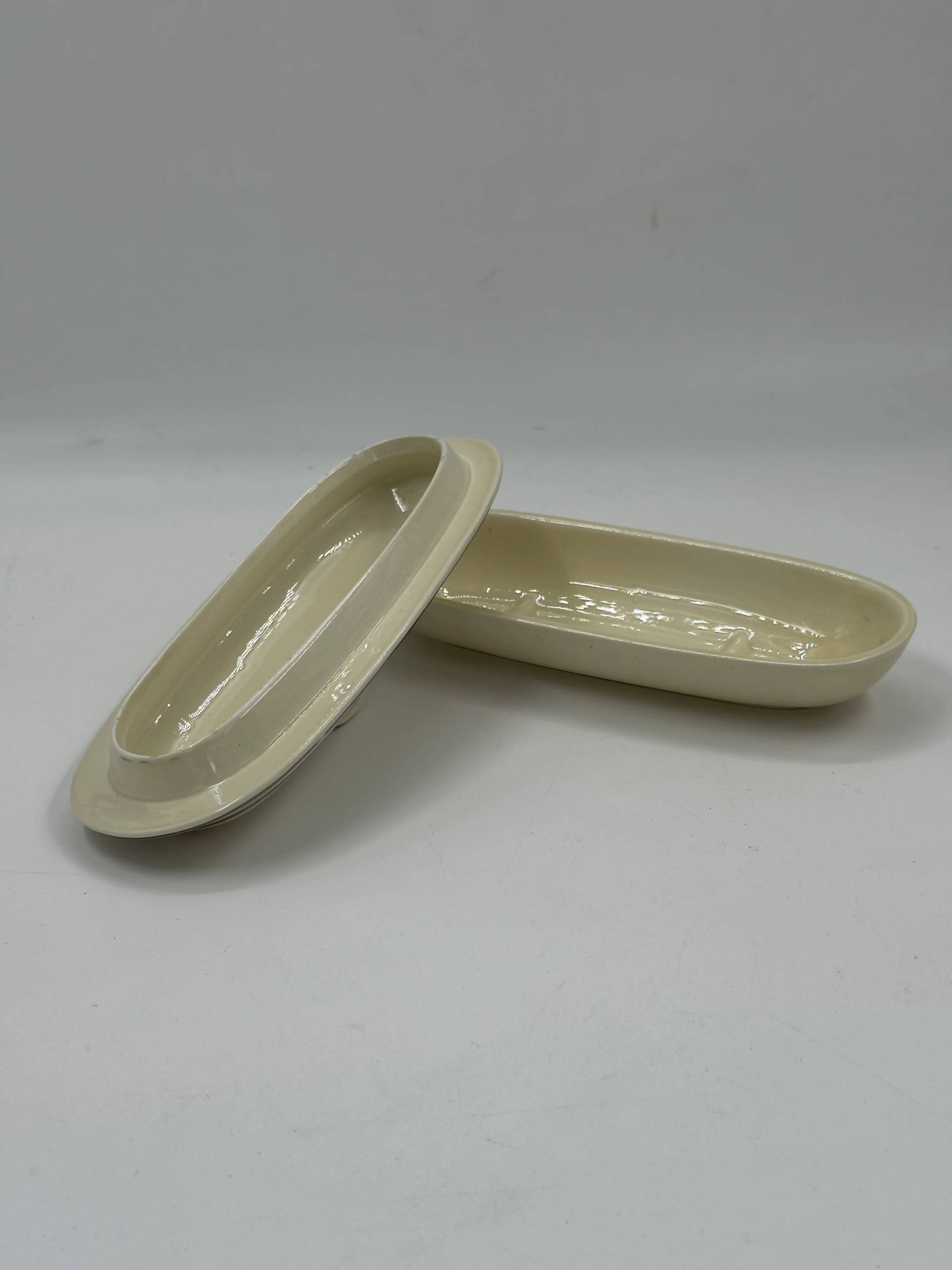 Vintage Art Deco butter dish in ivory ceramic with platinum stripes.