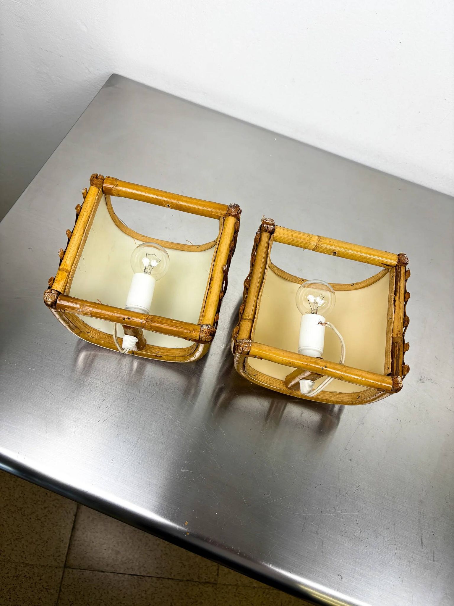 Pair of mid-century rattan wall sconces, 1960s, Italy