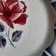 Old mismatched earthenware dinner plates