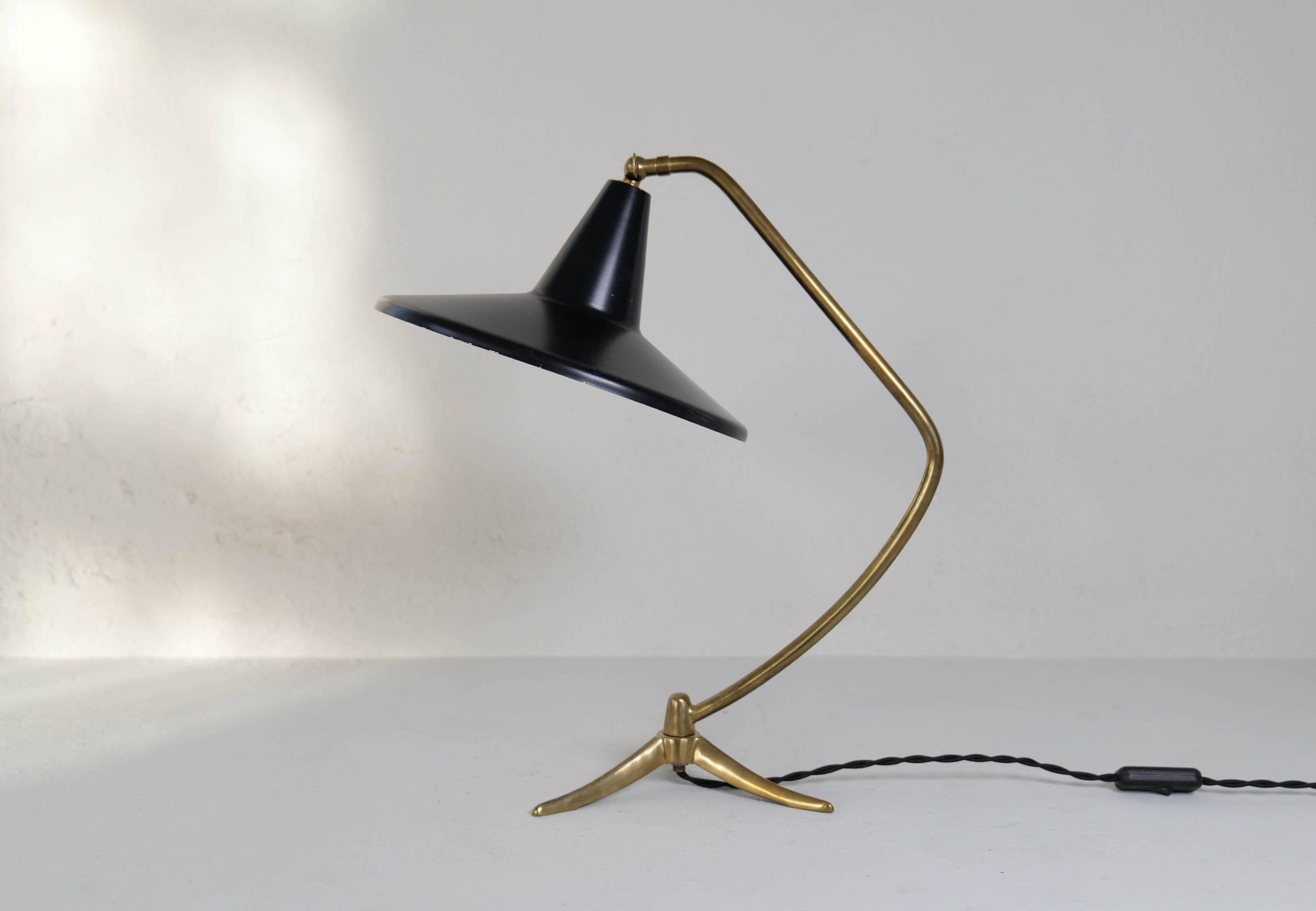 Brass table lamp on a tripod in modern Swedish style, Sweden, 1950.