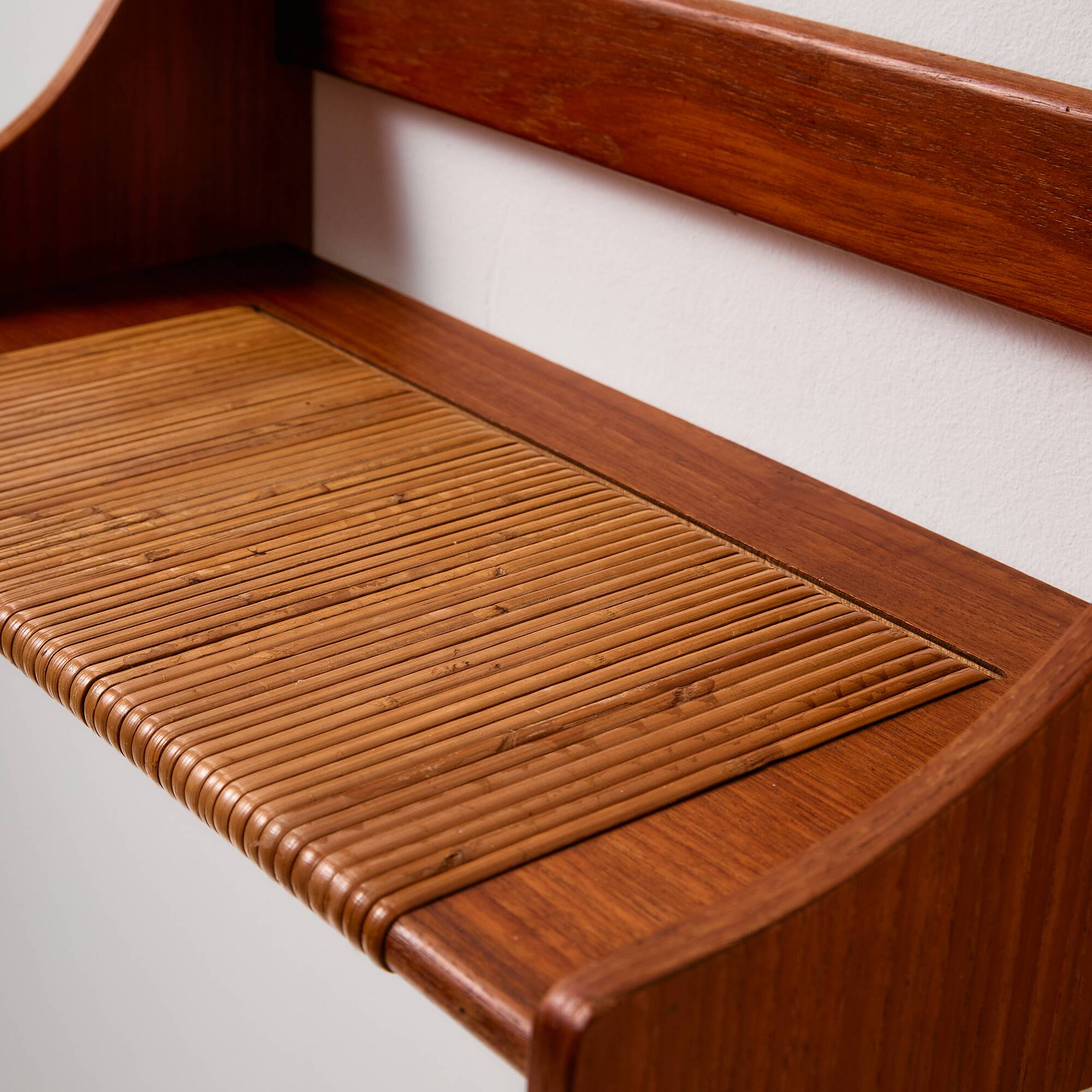 Teak wall shelf with cane details
