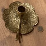 Brass candle holder on frame