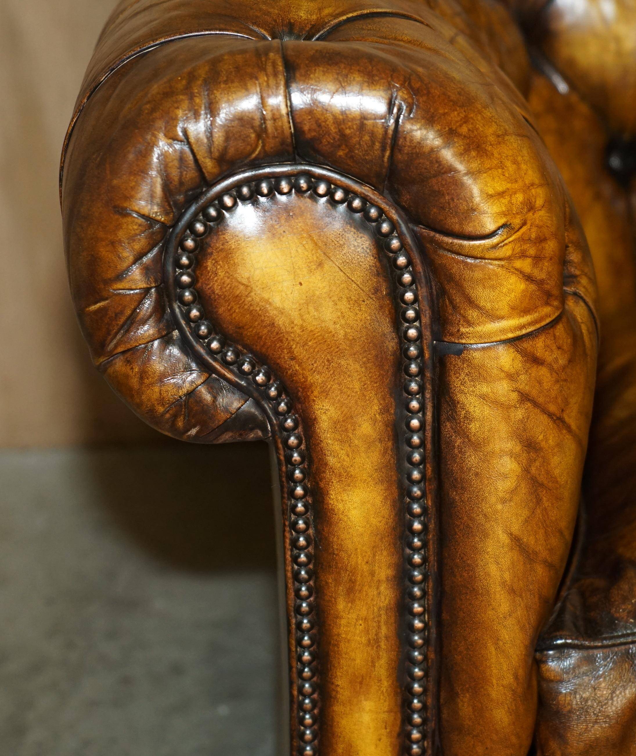 Vintage Chesterfield leather sofa bed, fully restored, circa 1940.