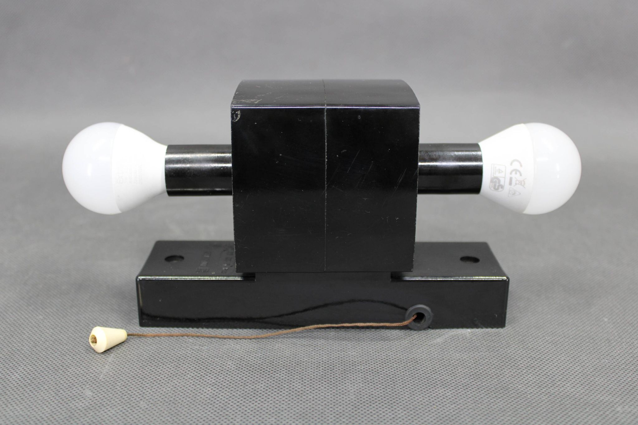 Mid-century wall light in bakelite and glass, 1960s