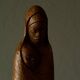 Sculpture of a woman and child in hand-carved wood, mid-20th century.