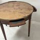 Louis XVI style bouillotte table in veneered wood, 20th century.