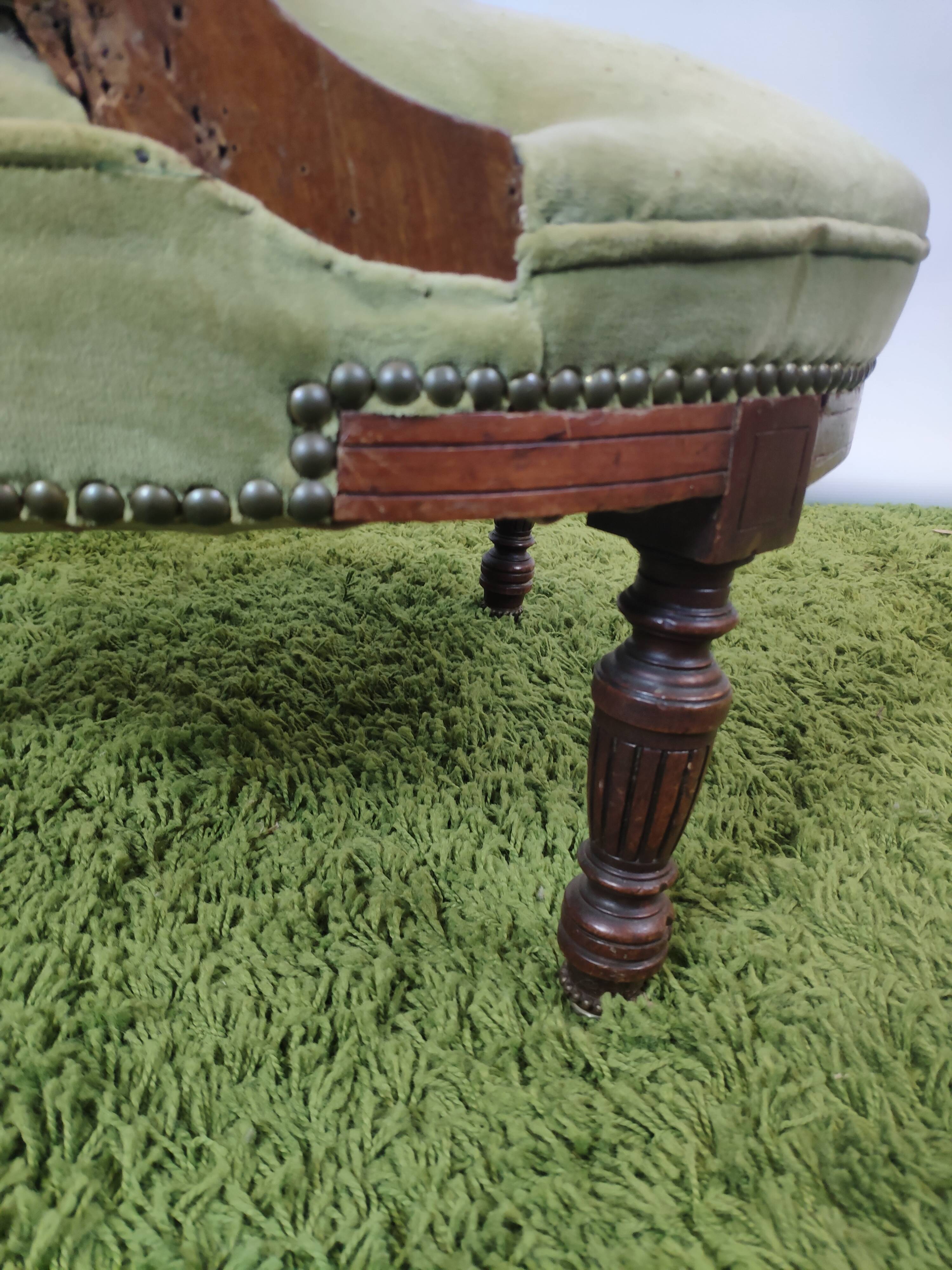 Old green velvet empire chair