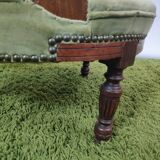 Old green velvet empire chair