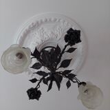 Chandelier with wrought iron and glass rose patterns