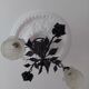 Chandelier with wrought iron and glass rose patterns