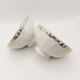 2 small gold ceramic bowls