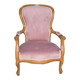 Fauteuil rose en bois