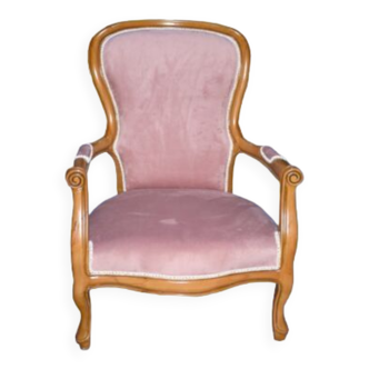 Fauteuil rose en bois