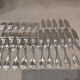11 silver-plated fish forks and 11 fish knives by Christofle Vendome