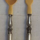 Silver and horned salad covers