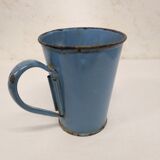 Old blue enamelled pitcher with spout