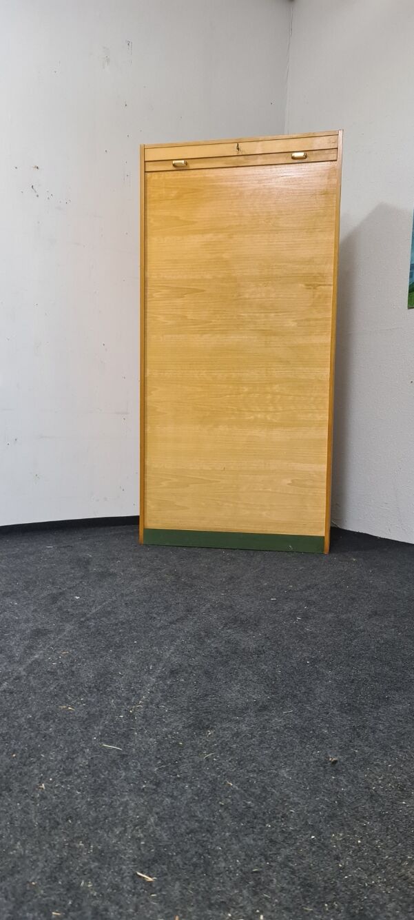 Vintage roll front cabinet by Wini