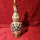 Antique ceramic lamp with brass or bronze base from the attic