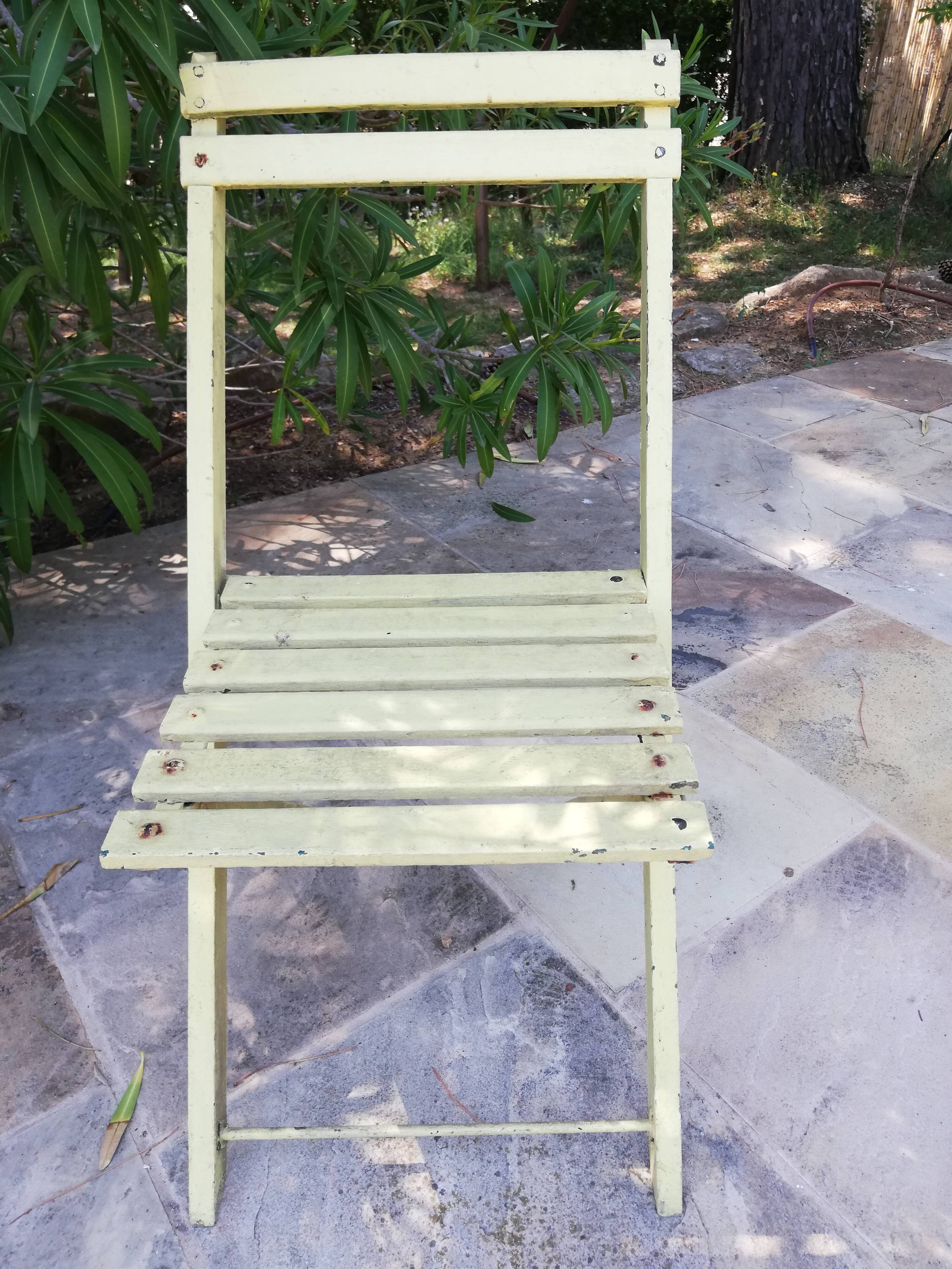 Two folding garden chairs
