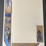Mirror with ceramic inclusion