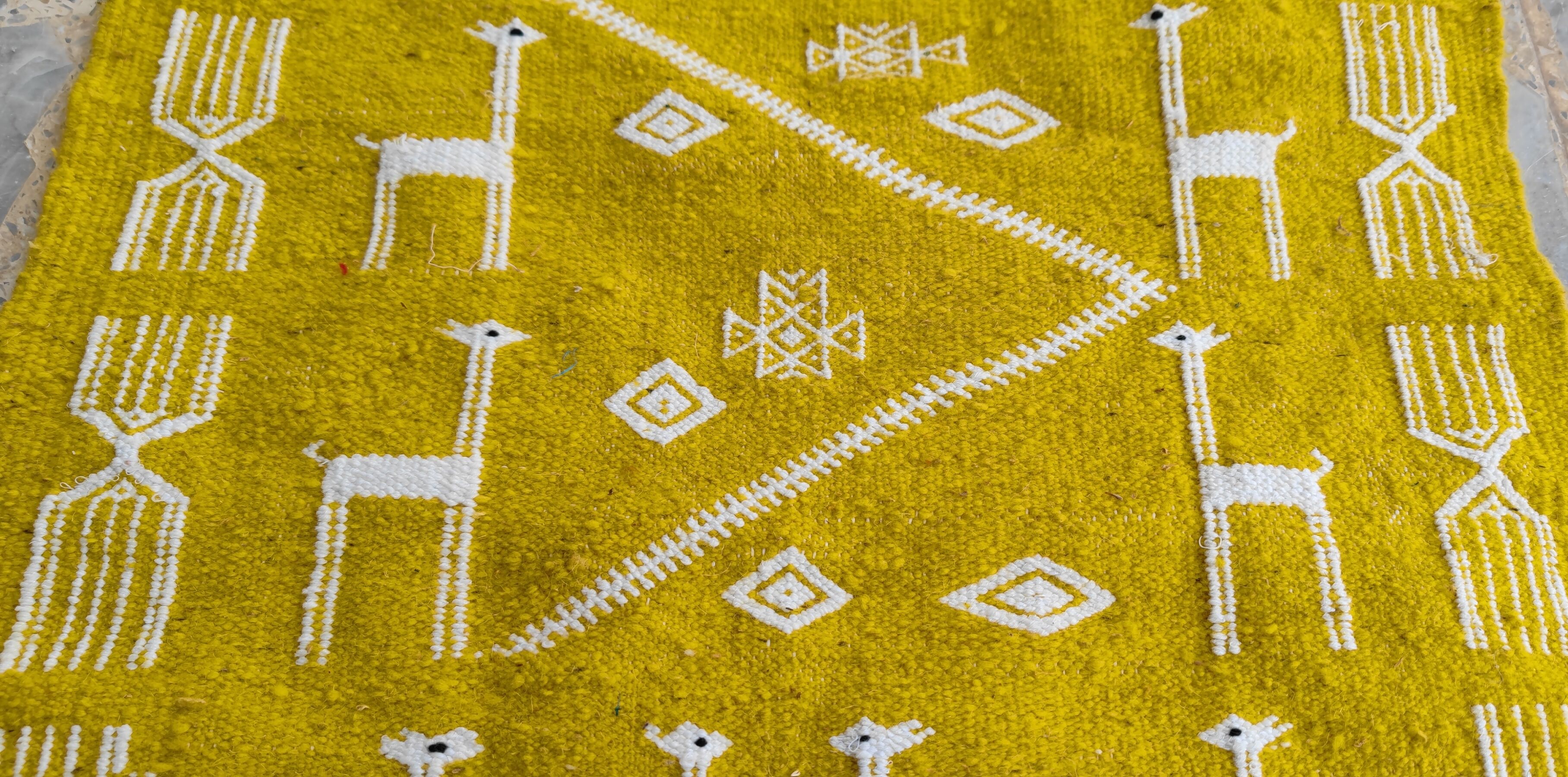 Hand-woven yellow and white kilim rug in natural wool