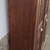 Old wooden cabinet with ceramic handles