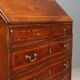 Antique drop-leaf cabinet in walnut with maple inlays, Italy, mid-18th century.