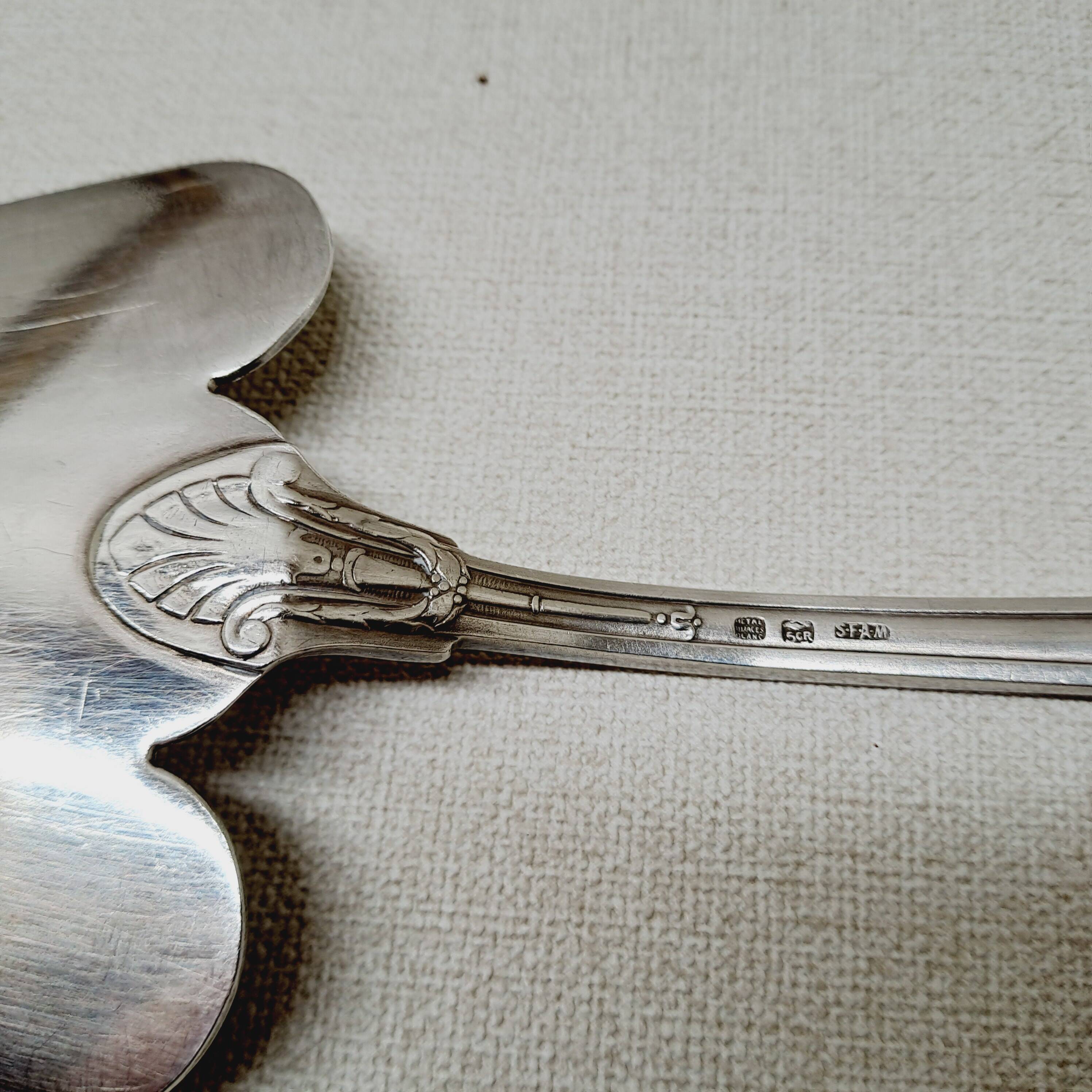 Silver metal cake server