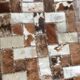Patchwork carpet in cowhide 164x105cm from the 70s