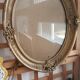 Golden oval frame XXth