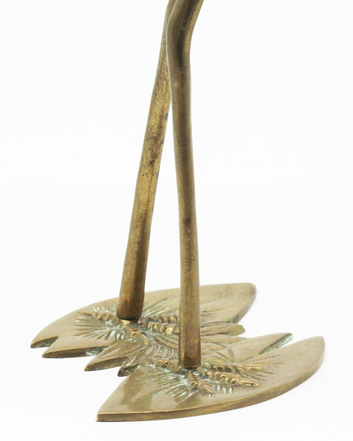 Brass heron statue