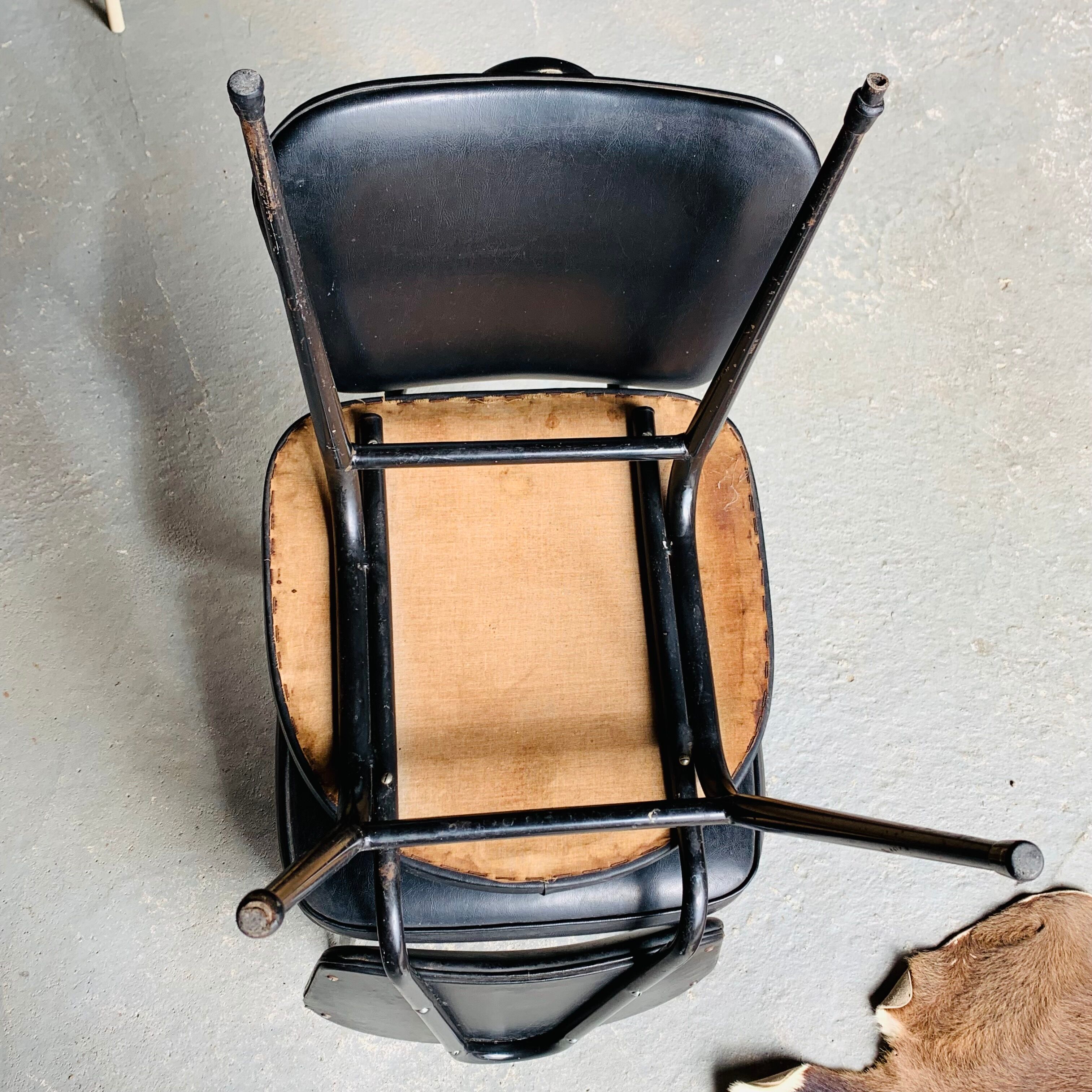 Pair of vintage black skai chairs