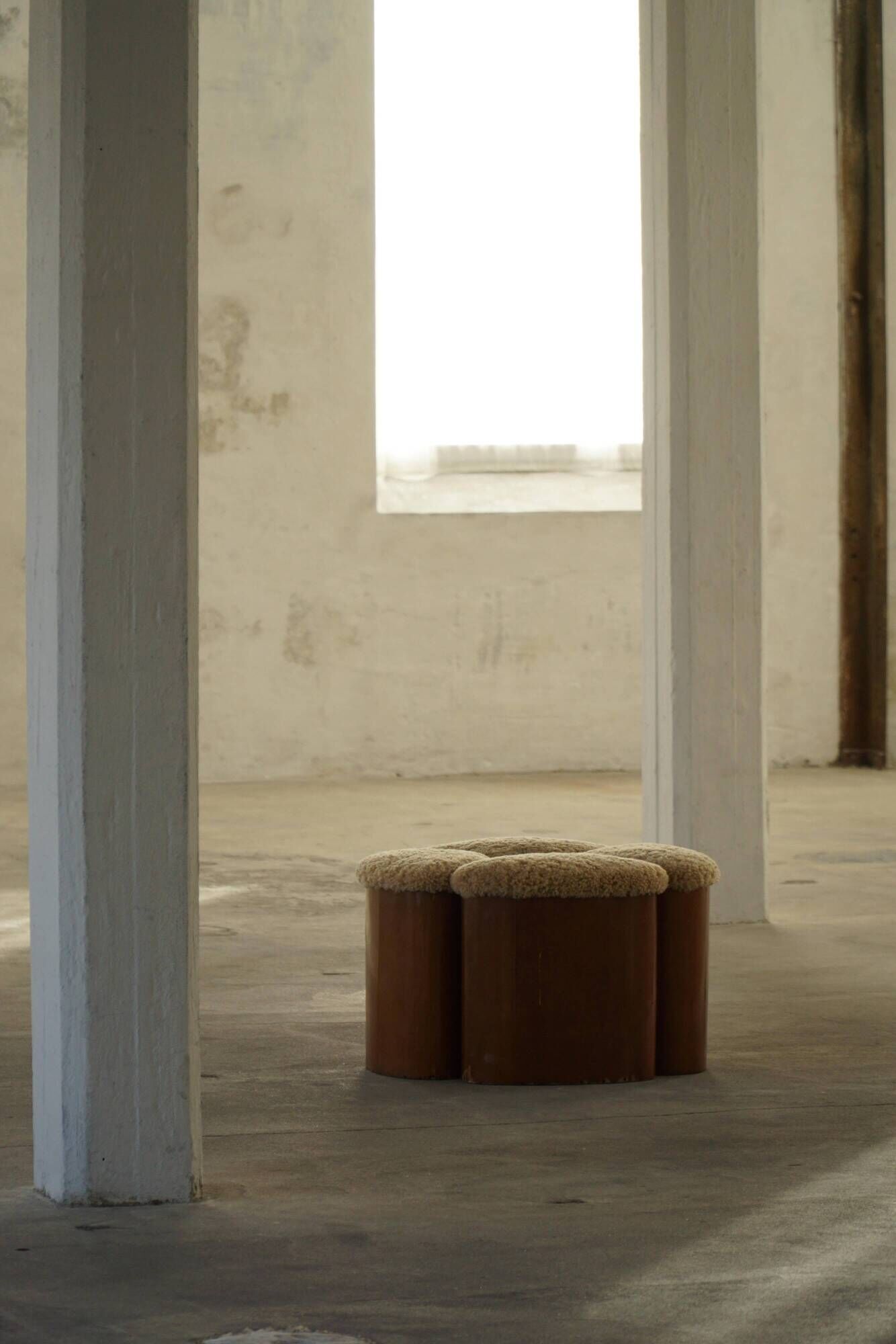 Set of 4 sculptural French Art Deco stools in wood and lamb's wool, 1940s.