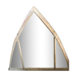 Metal mirror in the shape of an ogive