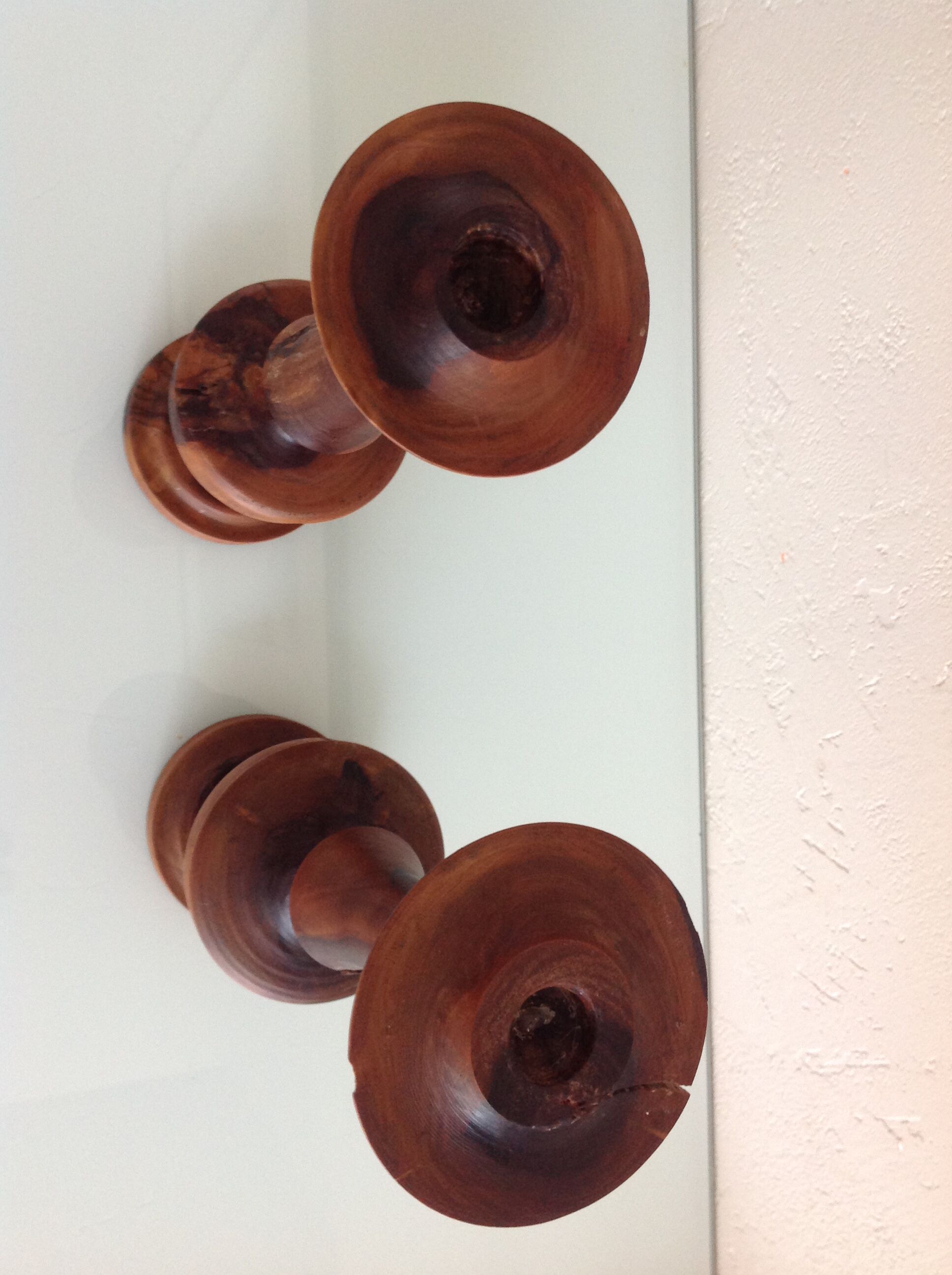 Pair of raw wood candlesticks