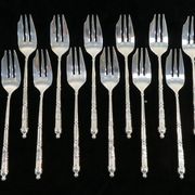 Set de 12 fourchettes a gateaux SFAM en métal argenté manche a la russe