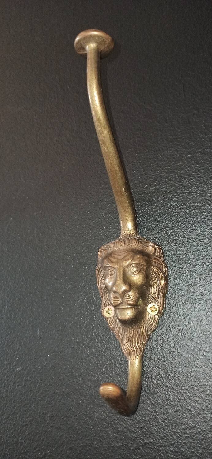 Set of 5 antique "Lion Head" coat hooks.