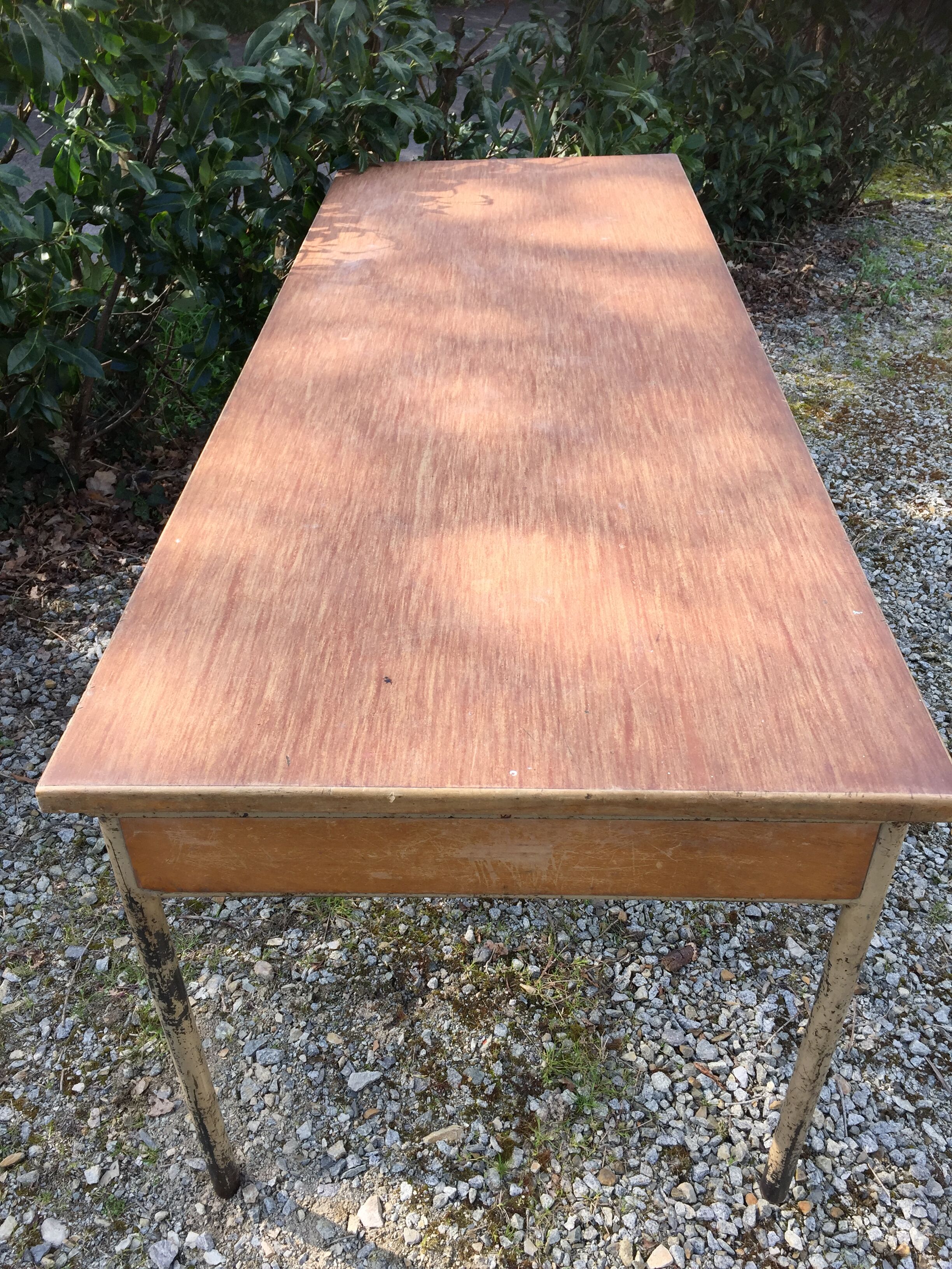 Vintage modernist table with metal tubular base