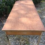 Vintage modernist table with metal tubular base
