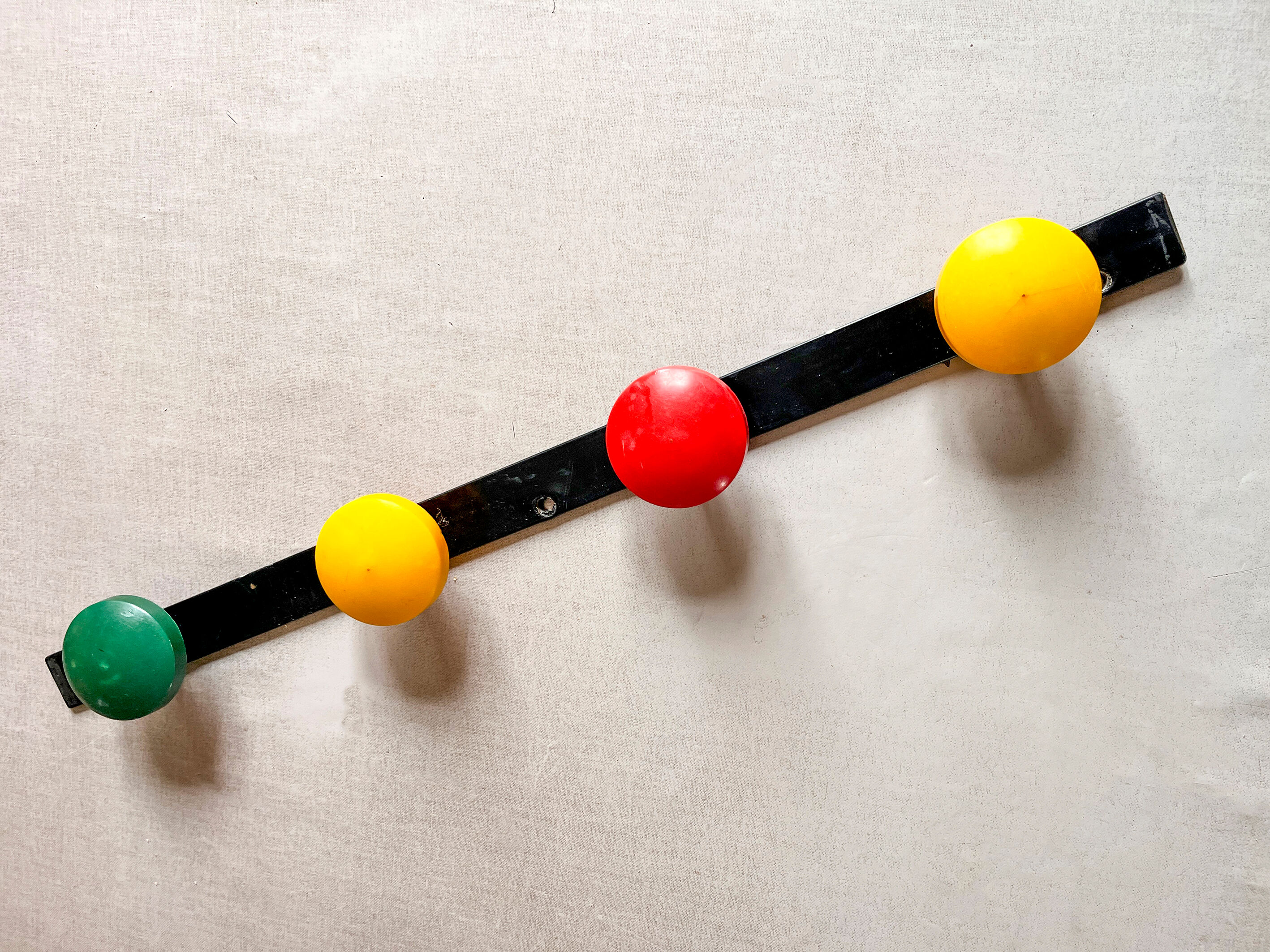 Vintage metal coat rack with colourful plastic hooks, 1960s.