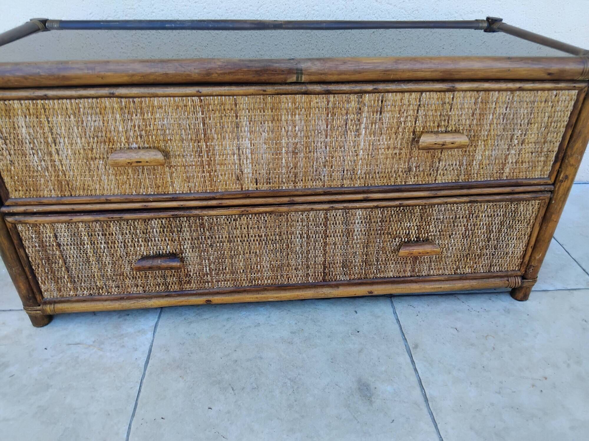 Vintage rattan and glass TV unit.