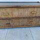 Vintage rattan and glass TV unit.